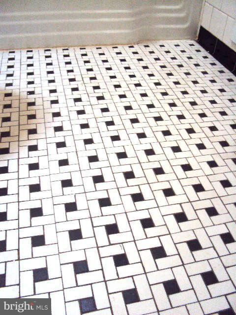 7832 Wynbrook Road Baltimore, MD 21224 - Photo 9 of 14 Bathroom Floor