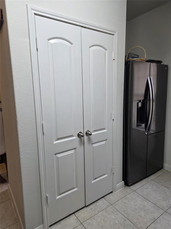 3009 Earl Road Anna, TX 75409 - Photo 6 of 9 a bathroom with a glass shower door