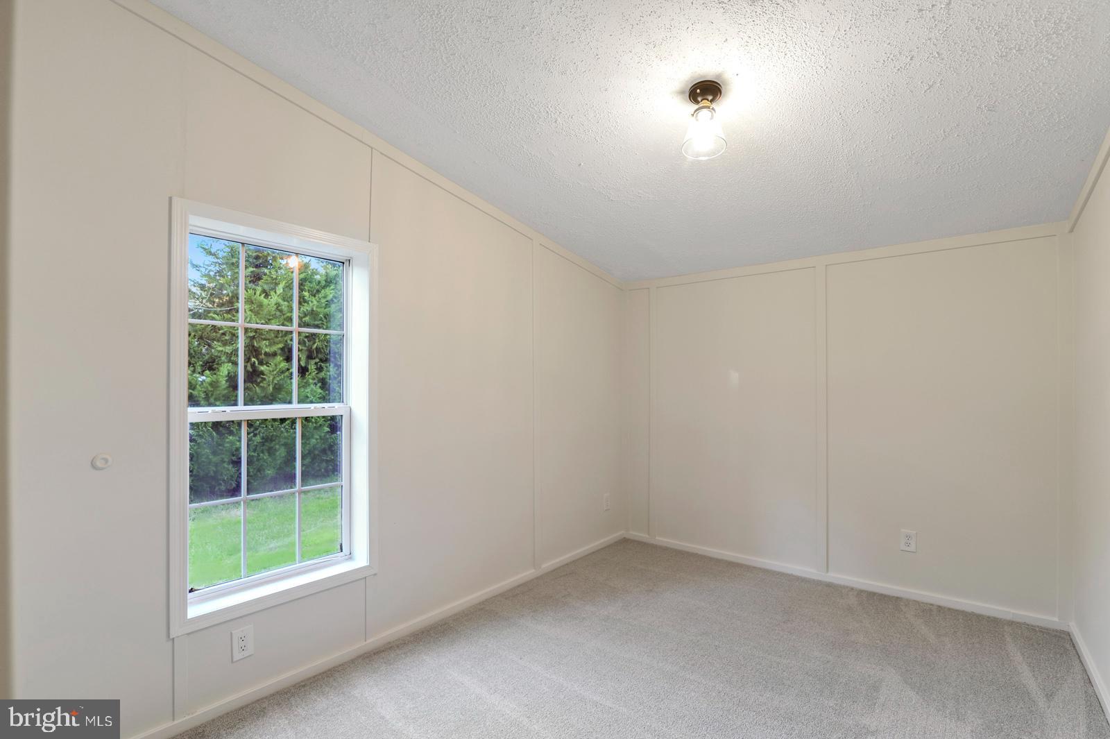 16745 Arvey Road Laurel, DE 19956 - Photo 33 of 35 an empty room with a window