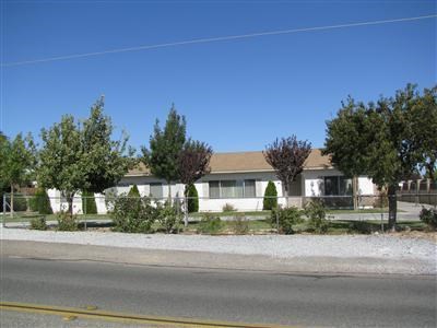 16180 Ranchero Road Hesperia, CA 92345 - Photo 1 of 1 Front of home with view of mountains. New Ranchero Road is low and out of direct view.