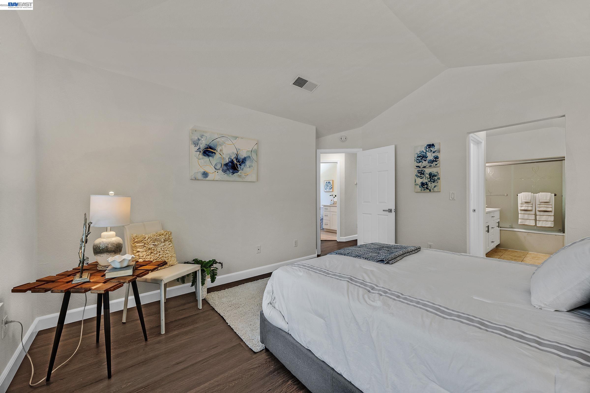 5012 Lakeview Drive, Unit 200 San Ramon, CA 94582 - Photo 19 of 47 a bedroom with a bed and a table in it