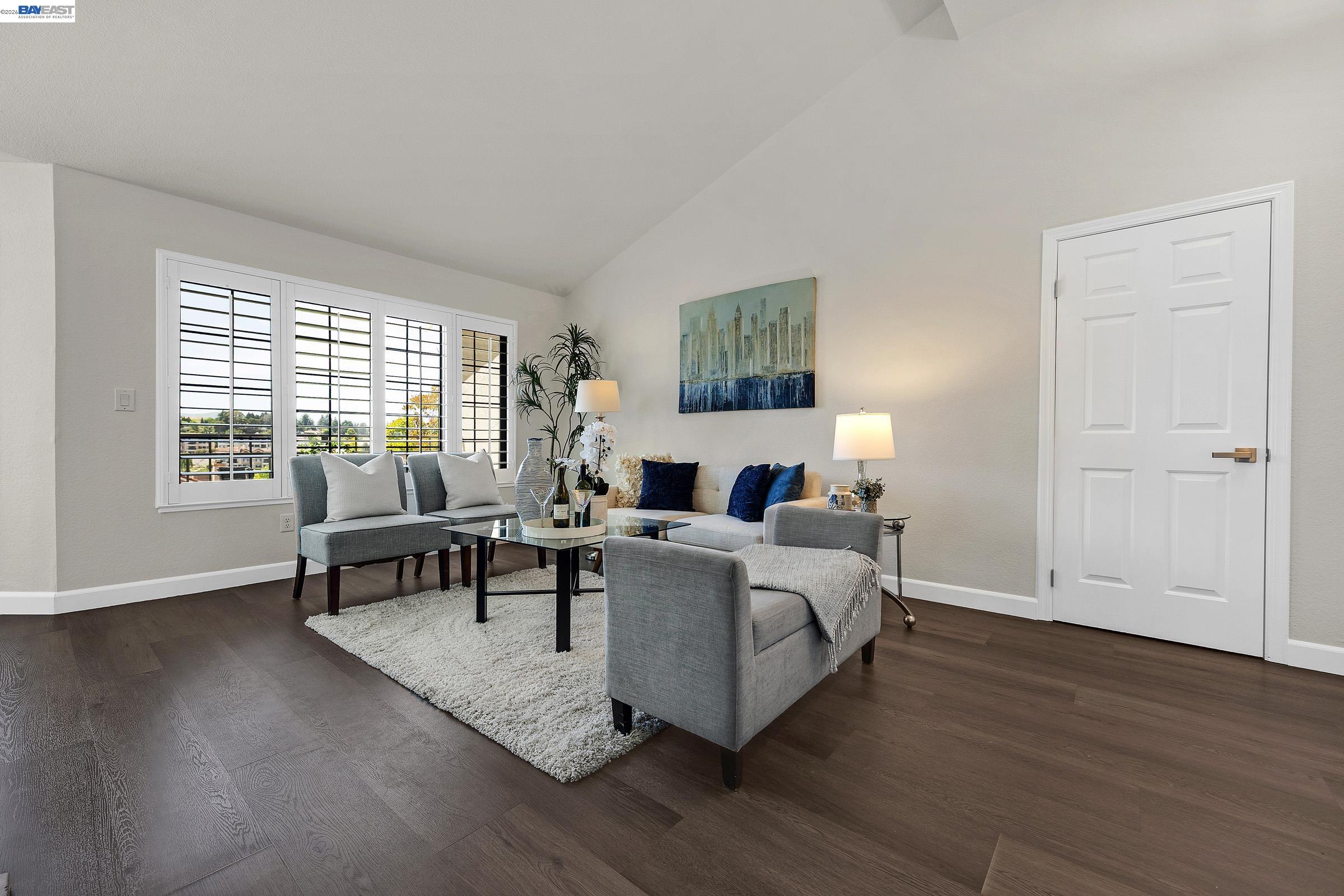 5012 Lakeview Drive, Unit 200 San Ramon, CA 94582 - Photo 5 of 47 a living room with furniture and a wooden floor