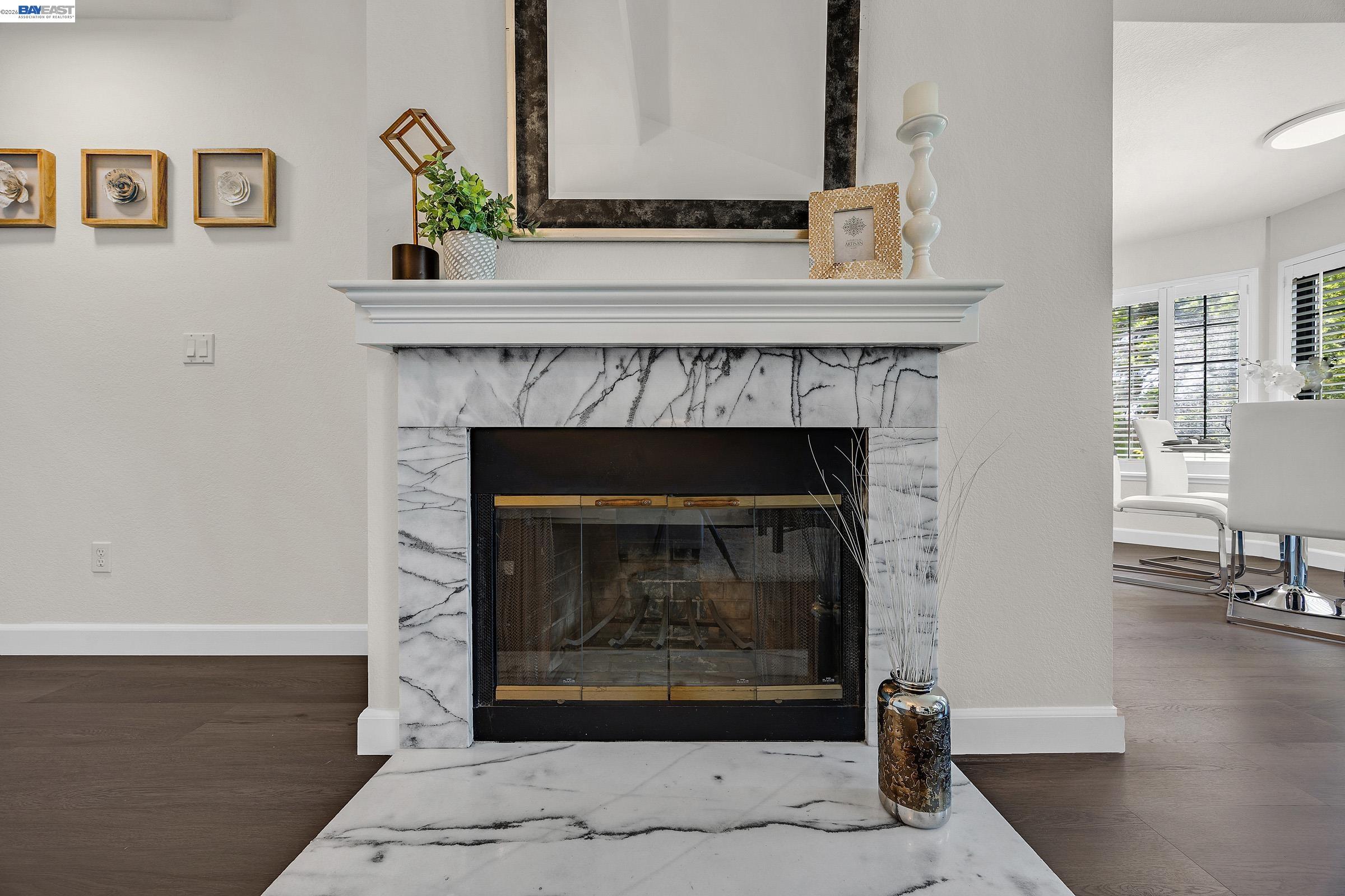 5012 Lakeview Drive, Unit 200 San Ramon, CA 94582 - Photo 6 of 47 a living room with a fireplace and wooden floor