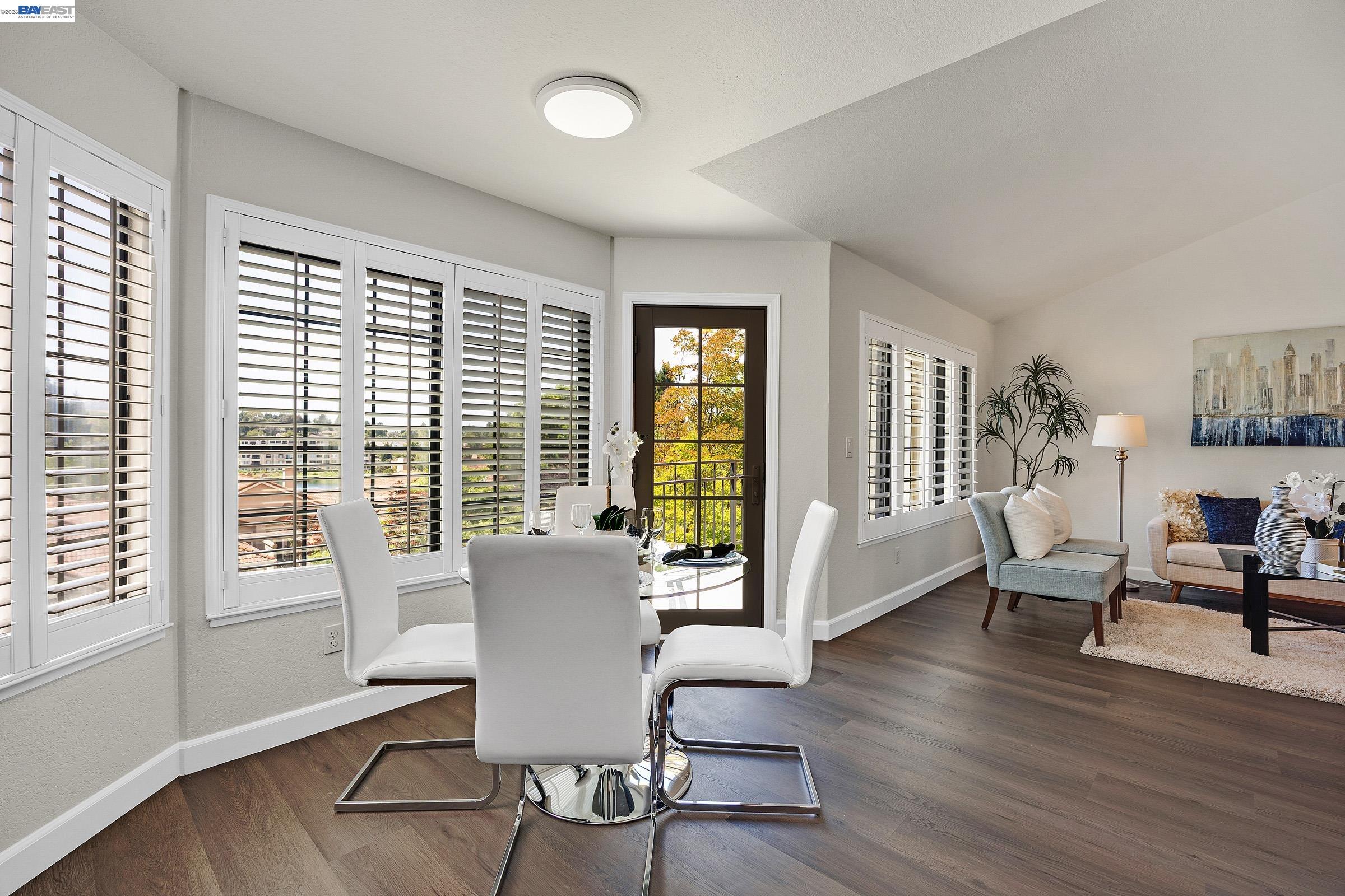5012 Lakeview Drive, Unit 200 San Ramon, CA 94582 - Photo 9 of 47 a view of a dining room with furniture and windows