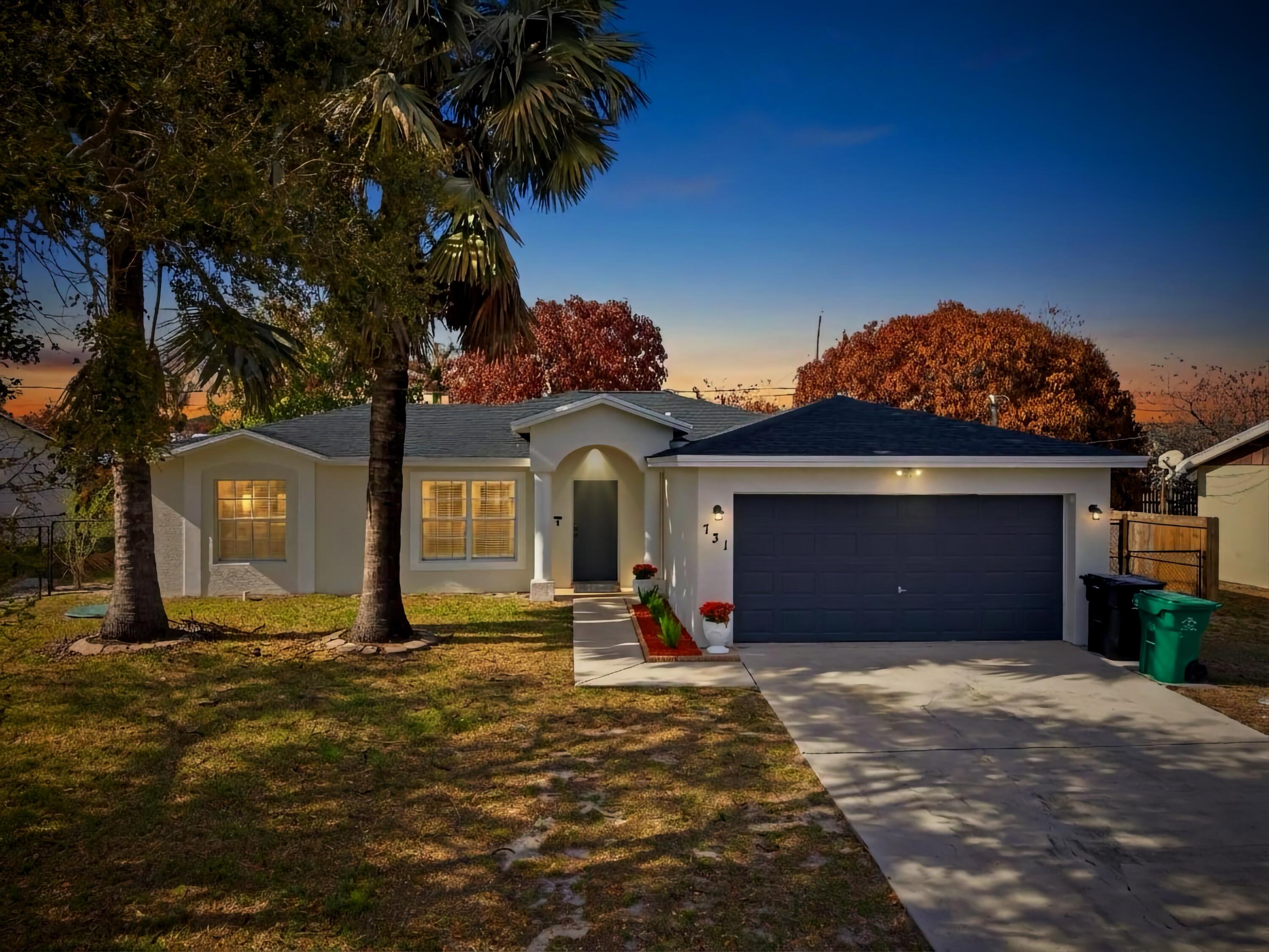 731 Southwest Bond Road Port St. Lucie, FL 34953 - Photo 1 of 31 Front Dusk