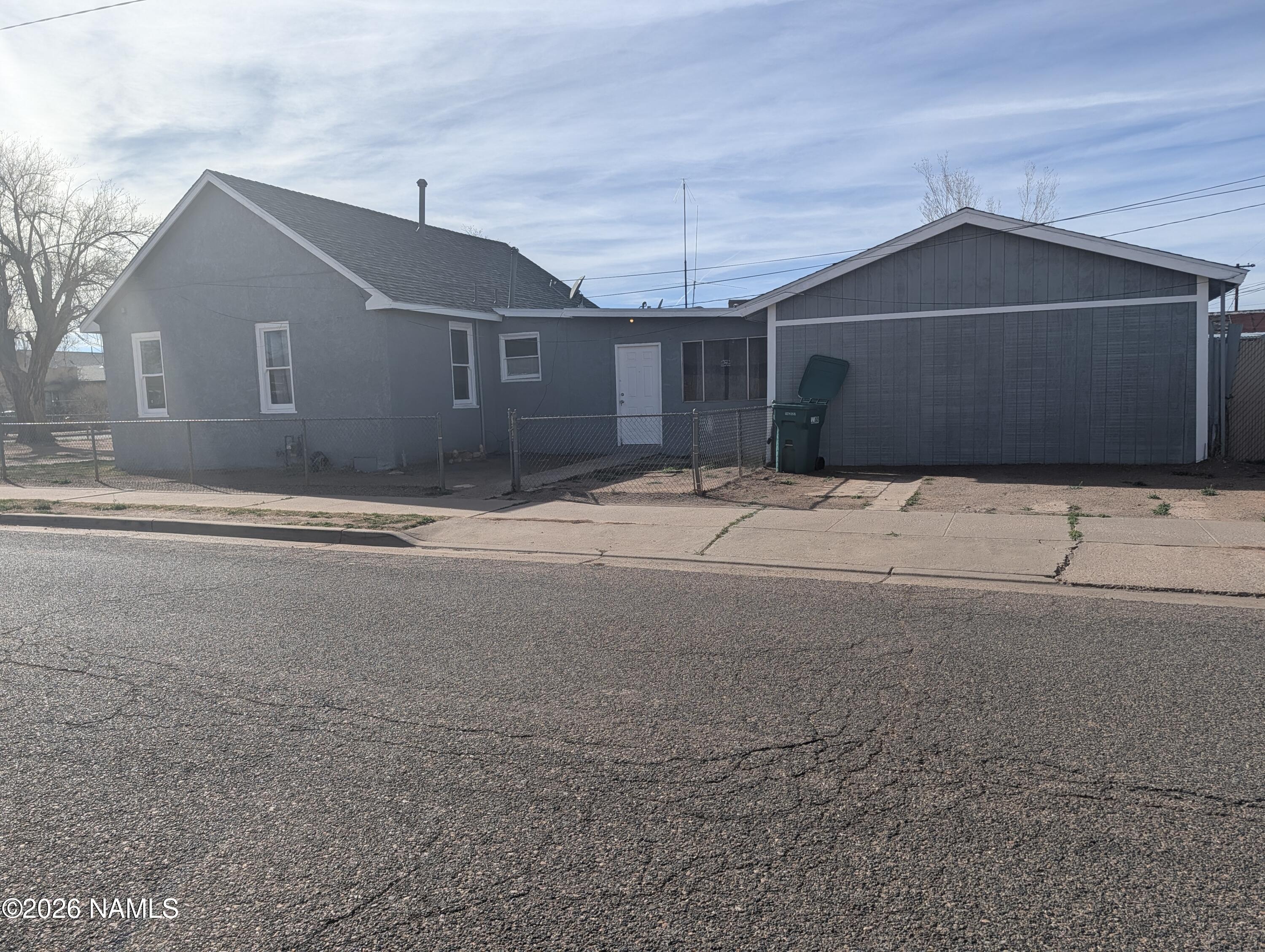 700 West Maple Street Winslow, AZ 86047 - Photo 3 of 15 a backyard of a house