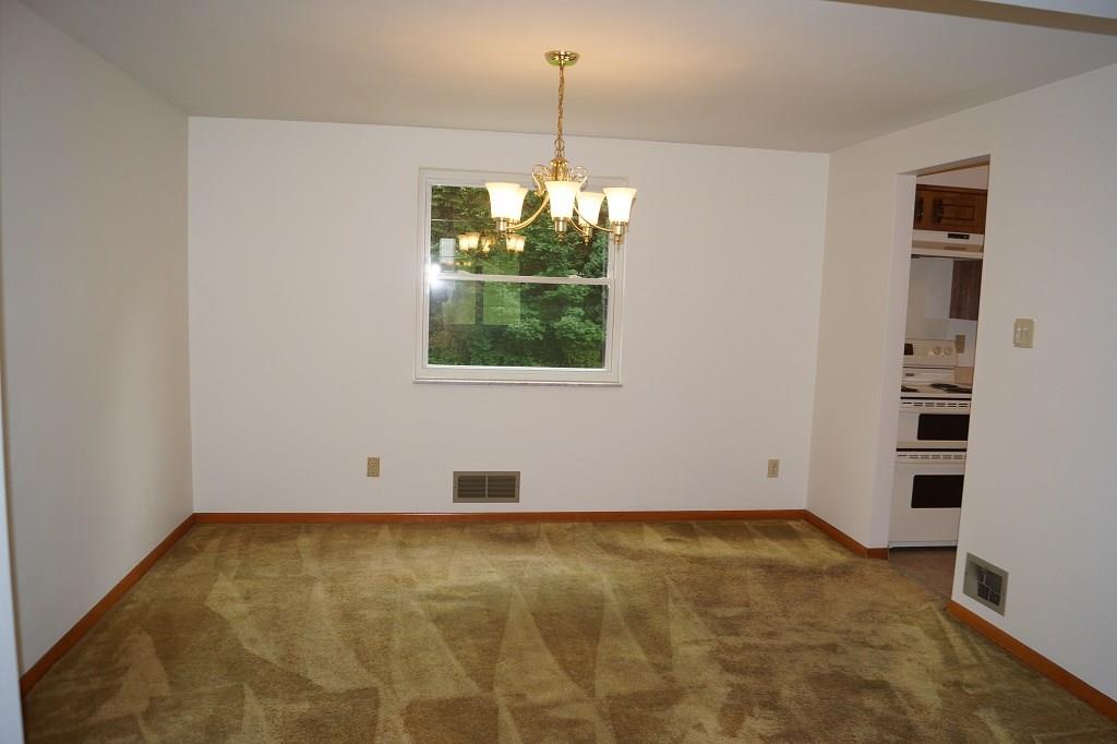 121 Kingsdale Road Pittsburgh, PA 15221 - Photo 6 of 25 Nice size dining room that also has hardwood floors under the carpet.