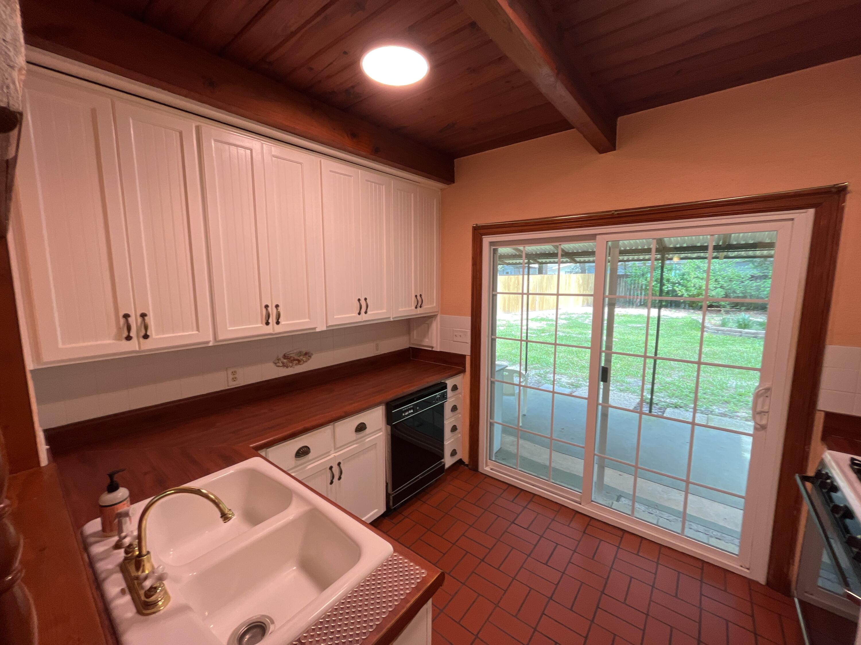 44 Meigs Drive Shalimar, FL 32579 - Photo 5 of 14 a kitchen with a sink and large window