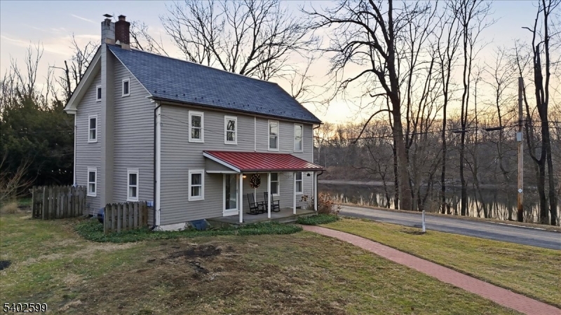 17 Old River Road Milford, NJ 08848 - Photo 1 of 46 a view of a house with backyard and a tree