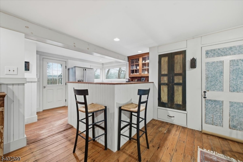 17 Old River Road Milford, NJ 08848 - Photo 12 of 46 a view of a dining room with furniture and wooden floor