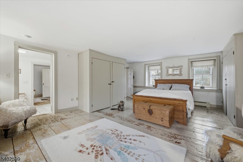 17 Old River Road Milford, NJ 08848 - Photo 19 of 46 a bedroom with a bed and a dresser