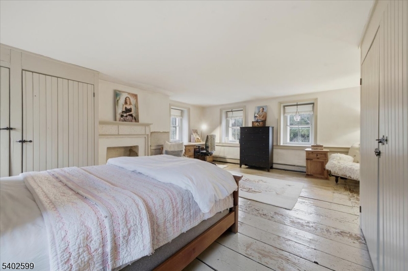 17 Old River Road Milford, NJ 08848 - Photo 21 of 46 a spacious bedroom with a bed and walk in closet