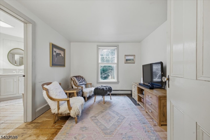17 Old River Road Milford, NJ 08848 - Photo 24 of 46 a living room with furniture and a flat screen tv