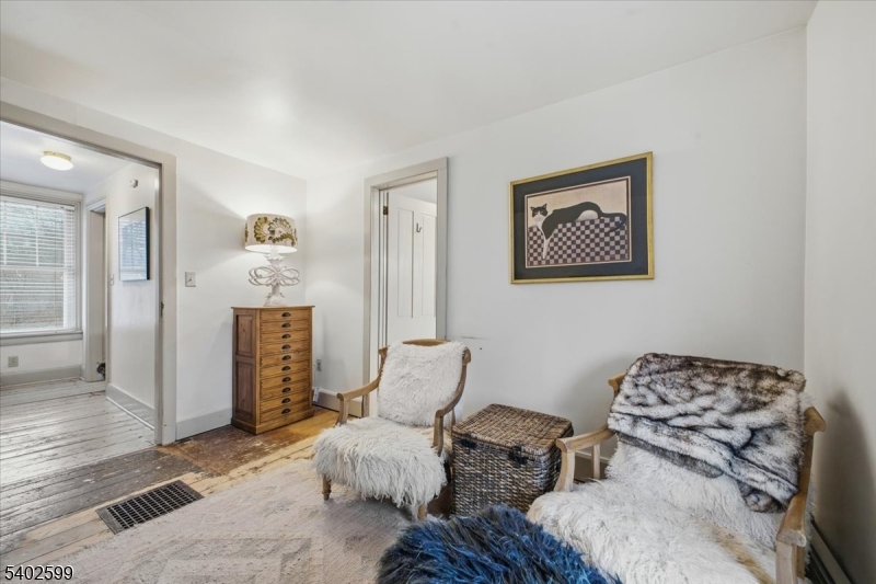 17 Old River Road Milford, NJ 08848 - Photo 25 of 46 a bedroom with furniture and a painting