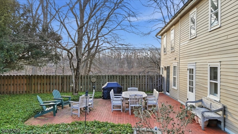 17 Old River Road Milford, NJ 08848 - Photo 28 of 46 a view of backyard with seating space and wooden fence