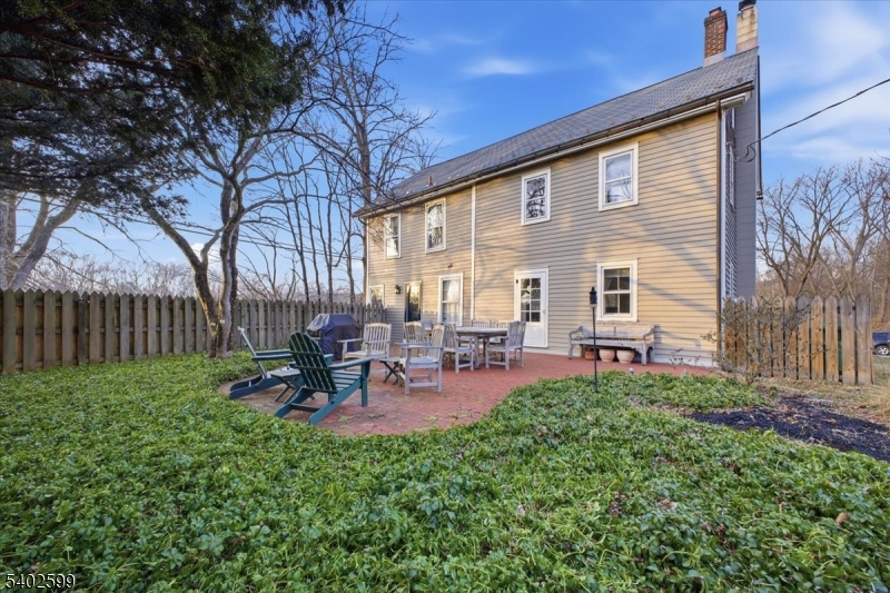 17 Old River Road Milford, NJ 08848 - Photo 29 of 46 a view of a chair and table in backyard of the house