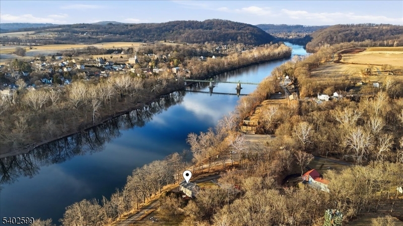 17 Old River Road Milford, NJ 08848 - Photo 32 of 46 a view of a lake with a mountain