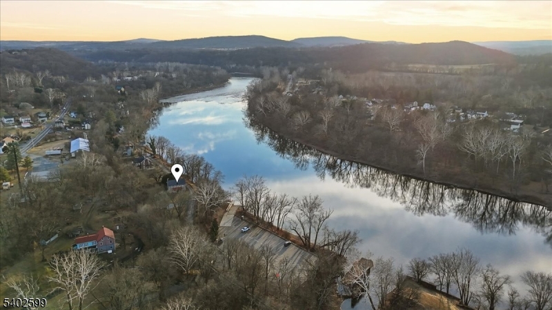 17 Old River Road Milford, NJ 08848 - Photo 38 of 46 a view of a lake in middle of forest