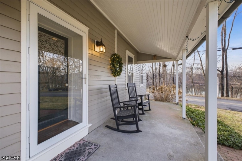 17 Old River Road Milford, NJ 08848 - Photo 5 of 46 a view of a chairs and table in the balcony