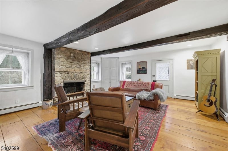 17 Old River Road Milford, NJ 08848 - Photo 6 of 46 a living room with furniture and a fireplace