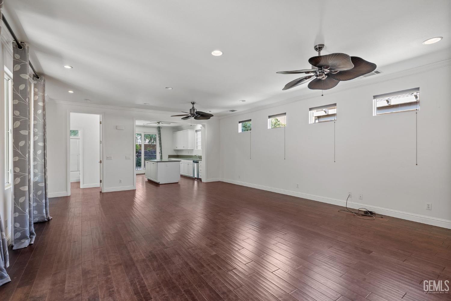 Undisclosed Address Bakersfield, CA 93306 - Photo 16 of 54 a view of a room with wooden floor