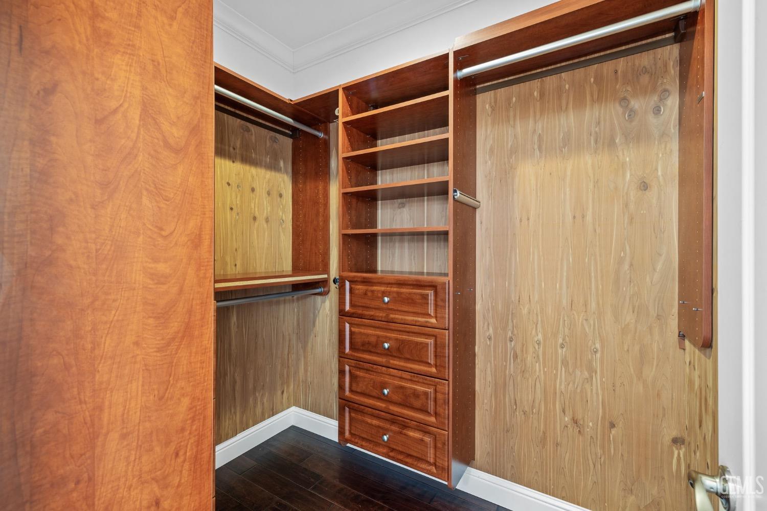 Undisclosed Address Bakersfield, CA 93306 - Photo 26 of 54 a view of walk in closet with empty racks