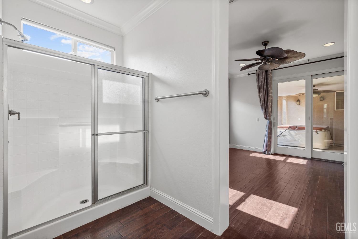 Undisclosed Address Bakersfield, CA 93306 - Photo 27 of 54 a view of a hallway with wooden floor
