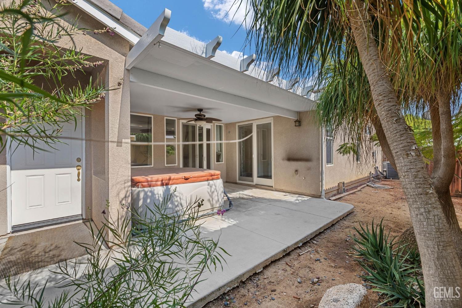 Undisclosed Address Bakersfield, CA 93306 - Photo 3 of 54 front view of a house with a yard