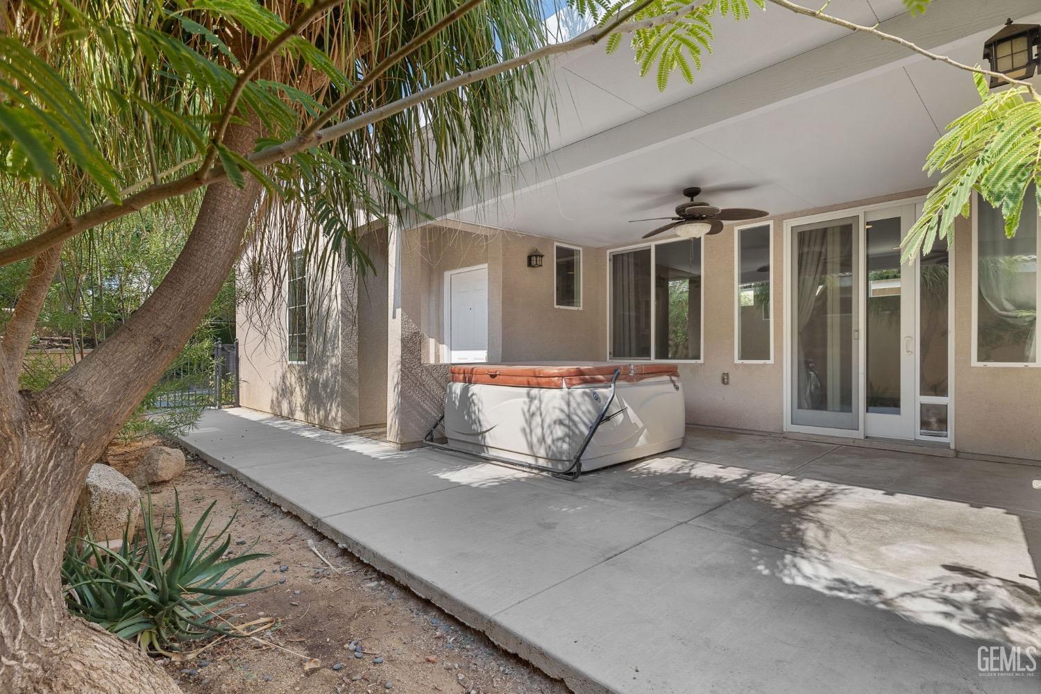Undisclosed Address Bakersfield, CA 93306 - Photo 37 of 54 a wooden bench sitting in front of a building