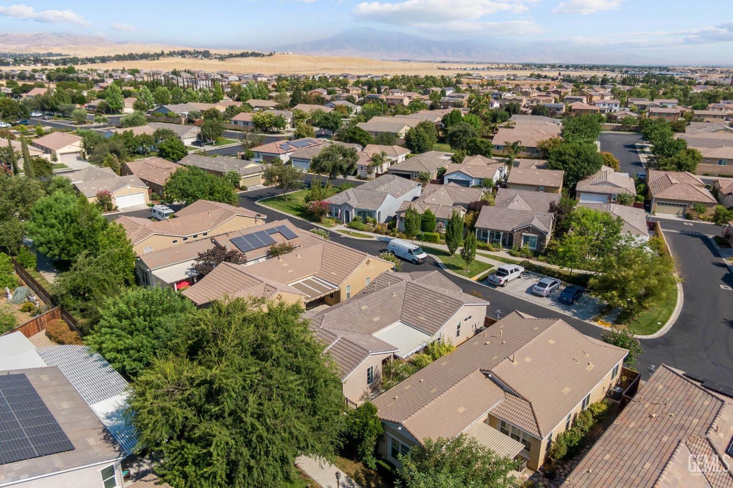 Undisclosed Address Bakersfield, CA 93306 - Photo 43 of 54 an aerial view of a house with a garden