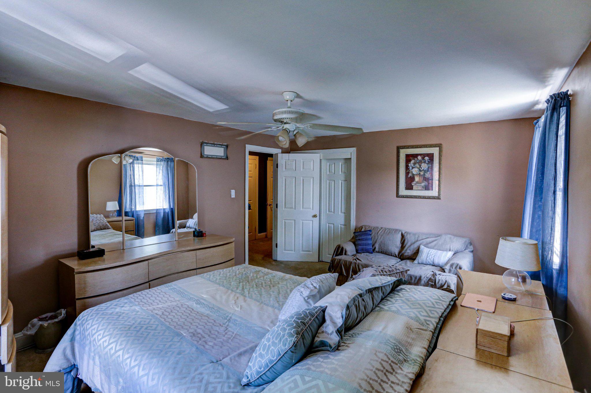 125 West Thomson Avenue Springfield, PA 19064 - Photo 32 of 41 Cozy bedroom with warm tones and light.