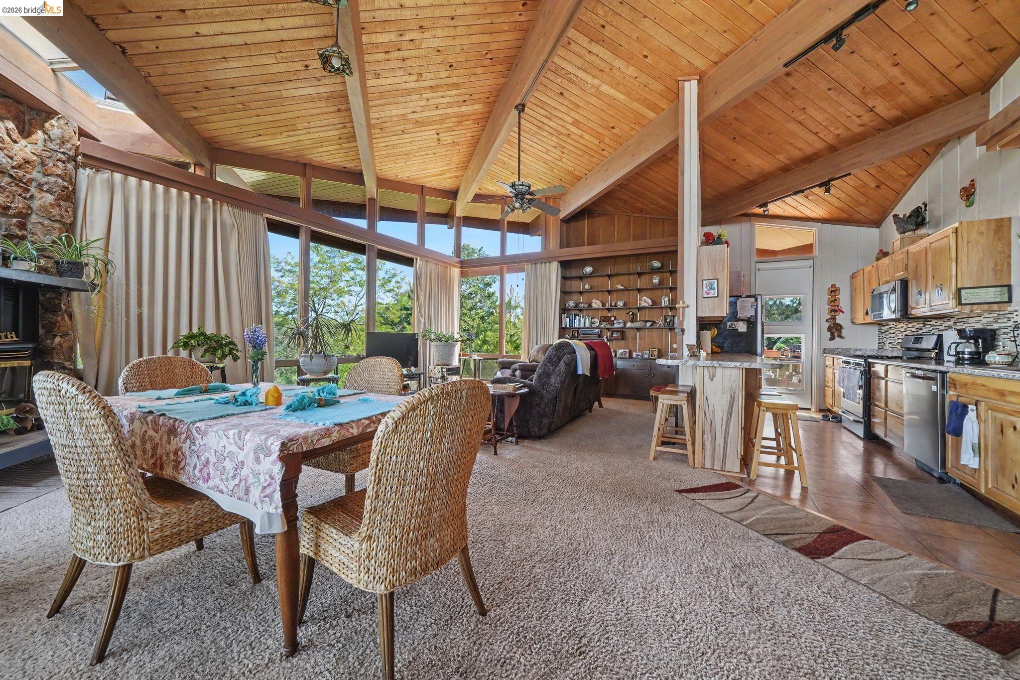 6161 Fullen Road Murphys, CA 95247 - Photo 23 of 53 a view of a dining room with furniture window and outside view