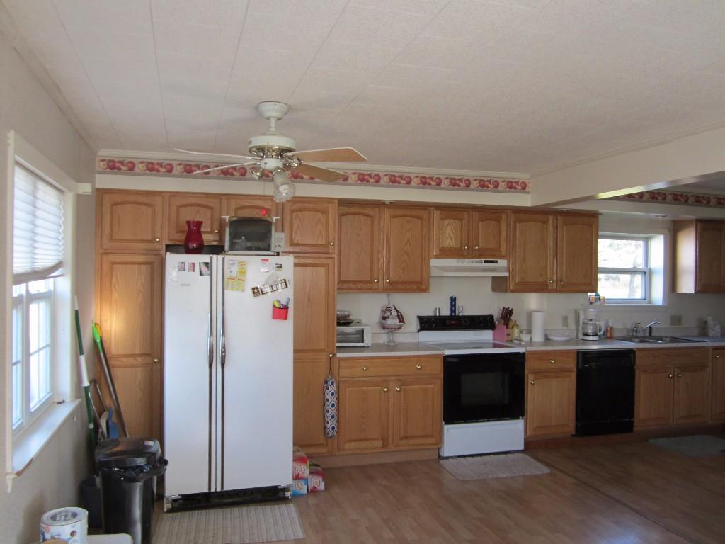 240 Grand Falls Road Limestone, ME 04750 - Photo 4 of 18 Kitchen area view from entry door.