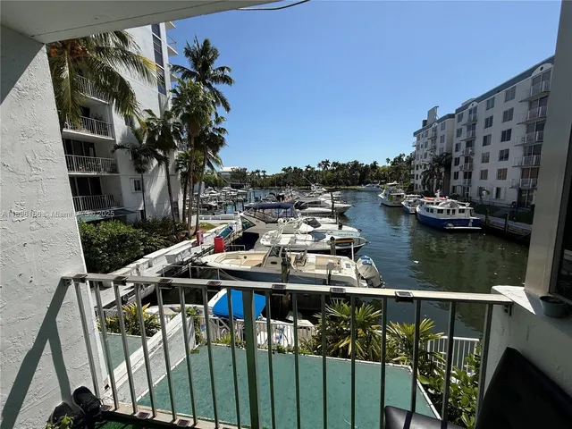 a view of balcony with furniture