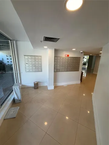 a view of empty room with a sink