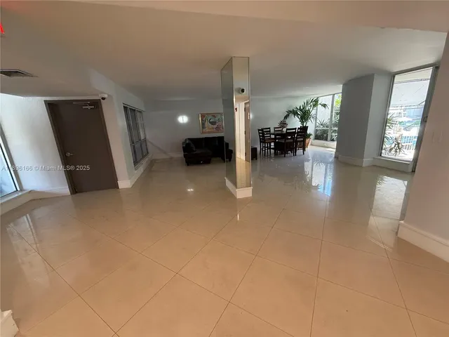 a view of a livingroom with furniture and a livingroom