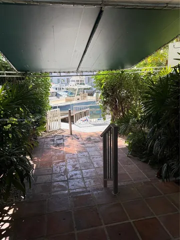 a view of a porch with a bench