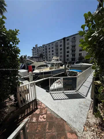 a view of a chairs and tables in the patio