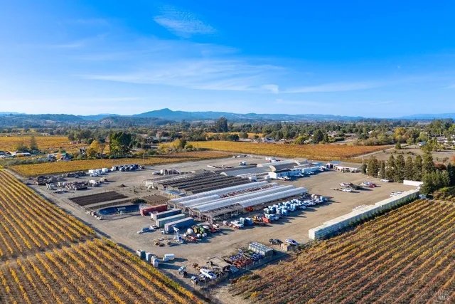a view of a house with backyard porch and sitting area