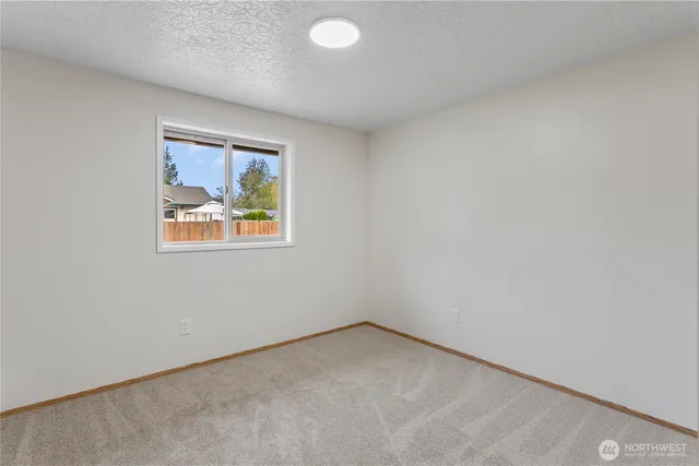 a house view with a backyard space