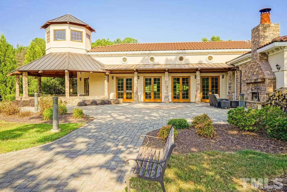 516 Gianna Drive, Unit 449 Clayton, NC 27527 - Photo 18 of 21 a front view of a house with a yard