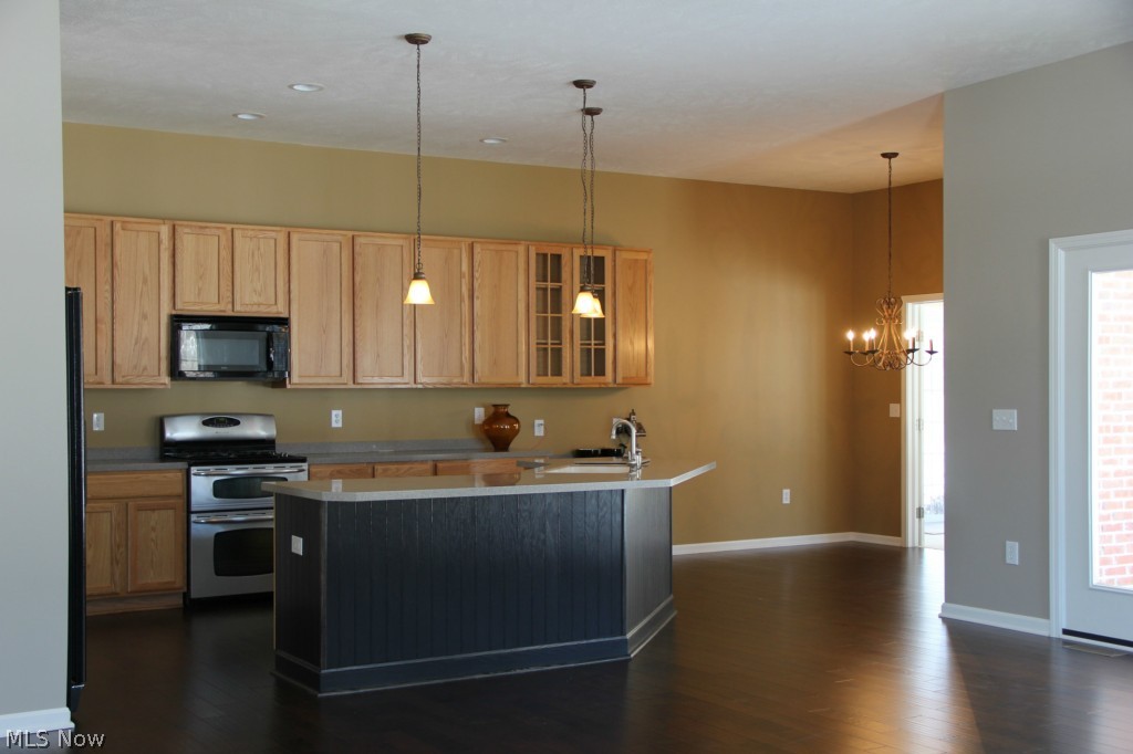 4631 Paxton Road Akron, OH 44321 - Photo 5 of 18 Kitchen with view towards the sun room and the side porch
