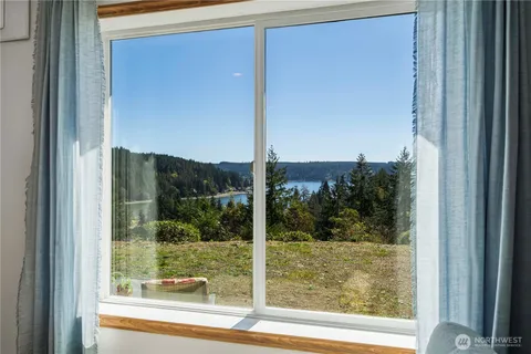 a view of a room that has a windows