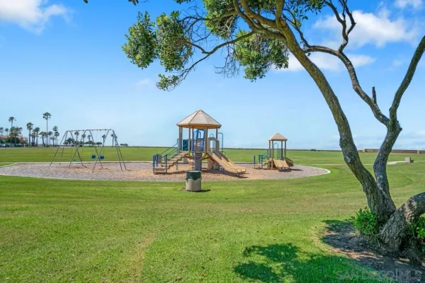 a view of a swimming pool with a yard