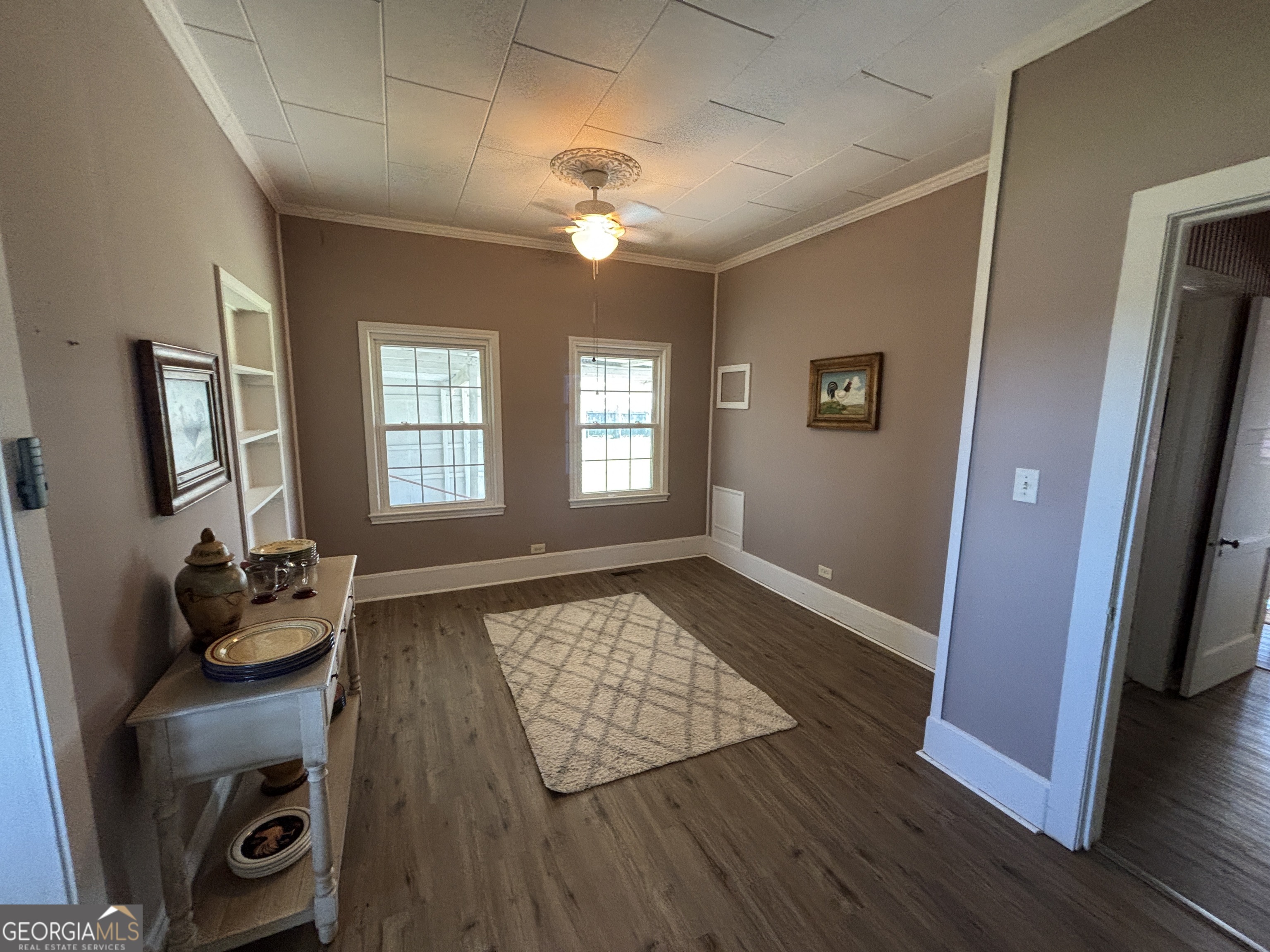 231 Barlow Road Cochran, GA 31014 - Photo 15 of 65 a view of a room with wooden floor and window