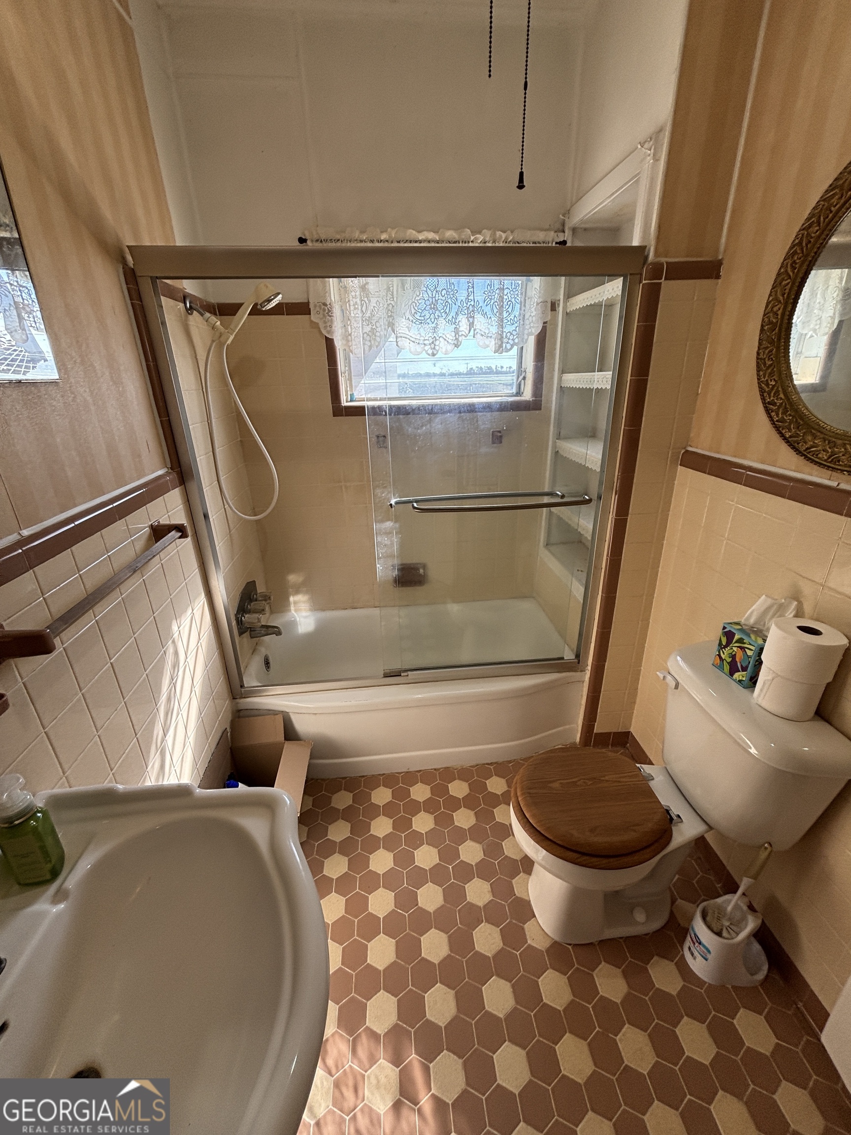 231 Barlow Road Cochran, GA 31014 - Photo 38 of 65 a bathroom with a sink and a mirror