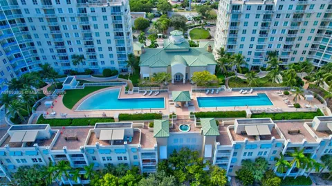 an aerial view of a houses with outdoor space