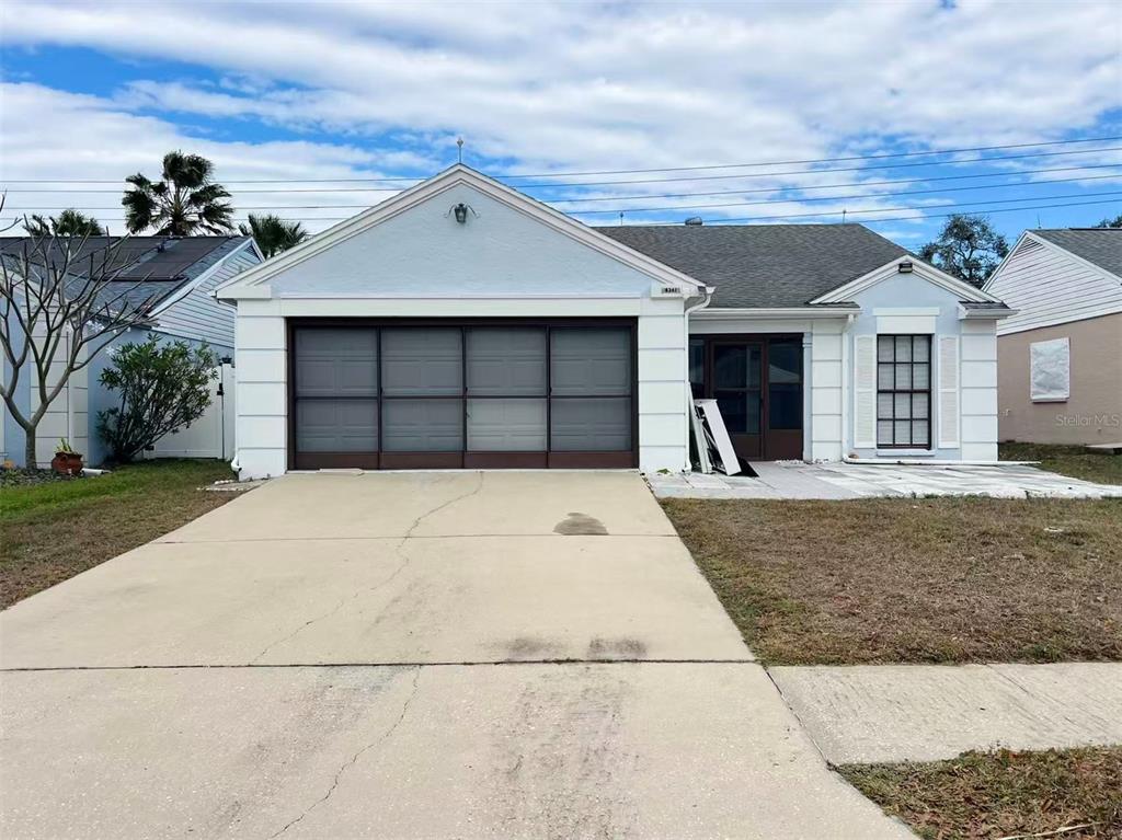 front view of a house with a yard