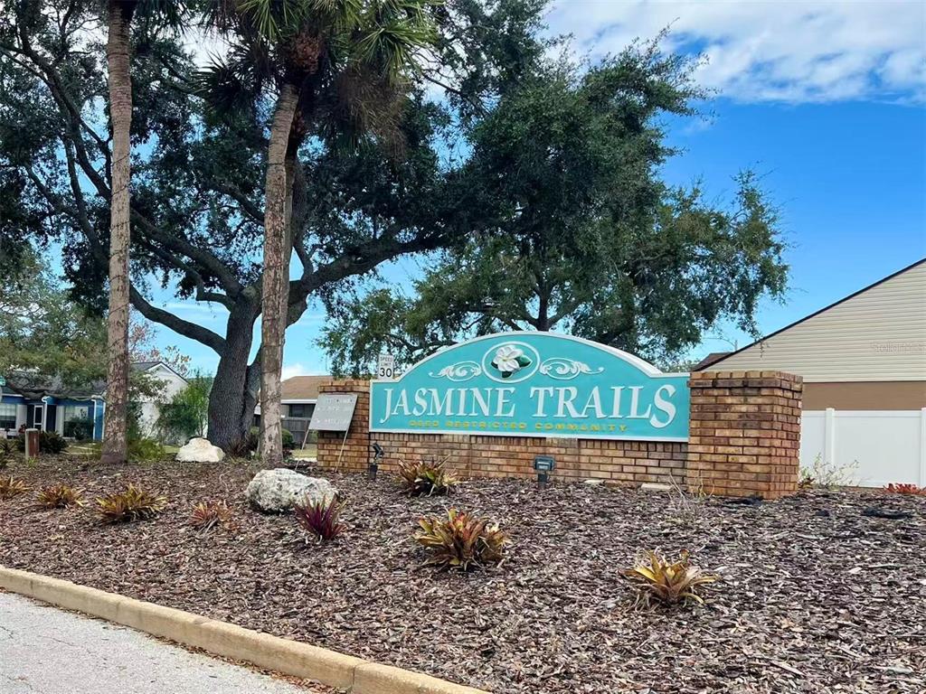 8341 Duval Drive Port Richey, FL 34668 - Photo 2 of 27 a sign that is on the side of the road