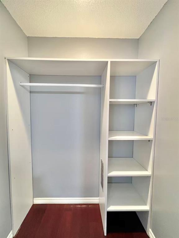 8341 Duval Drive Port Richey, FL 34668 - Photo 22 of 27 a view of an empty walk in closet